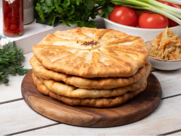 Плацинды на сковороде с квашеной капустой