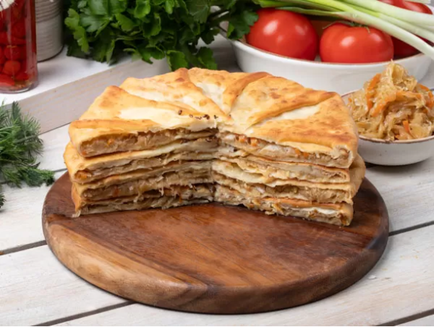 Плацинды на сковороде с квашеной капустой