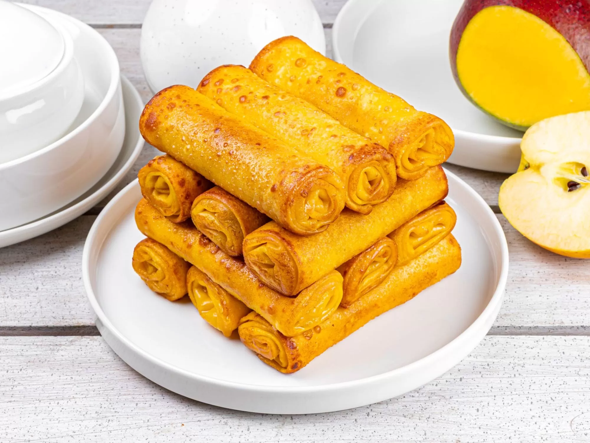 Clătite gratinate cu măr caramelizat și cremă de mango